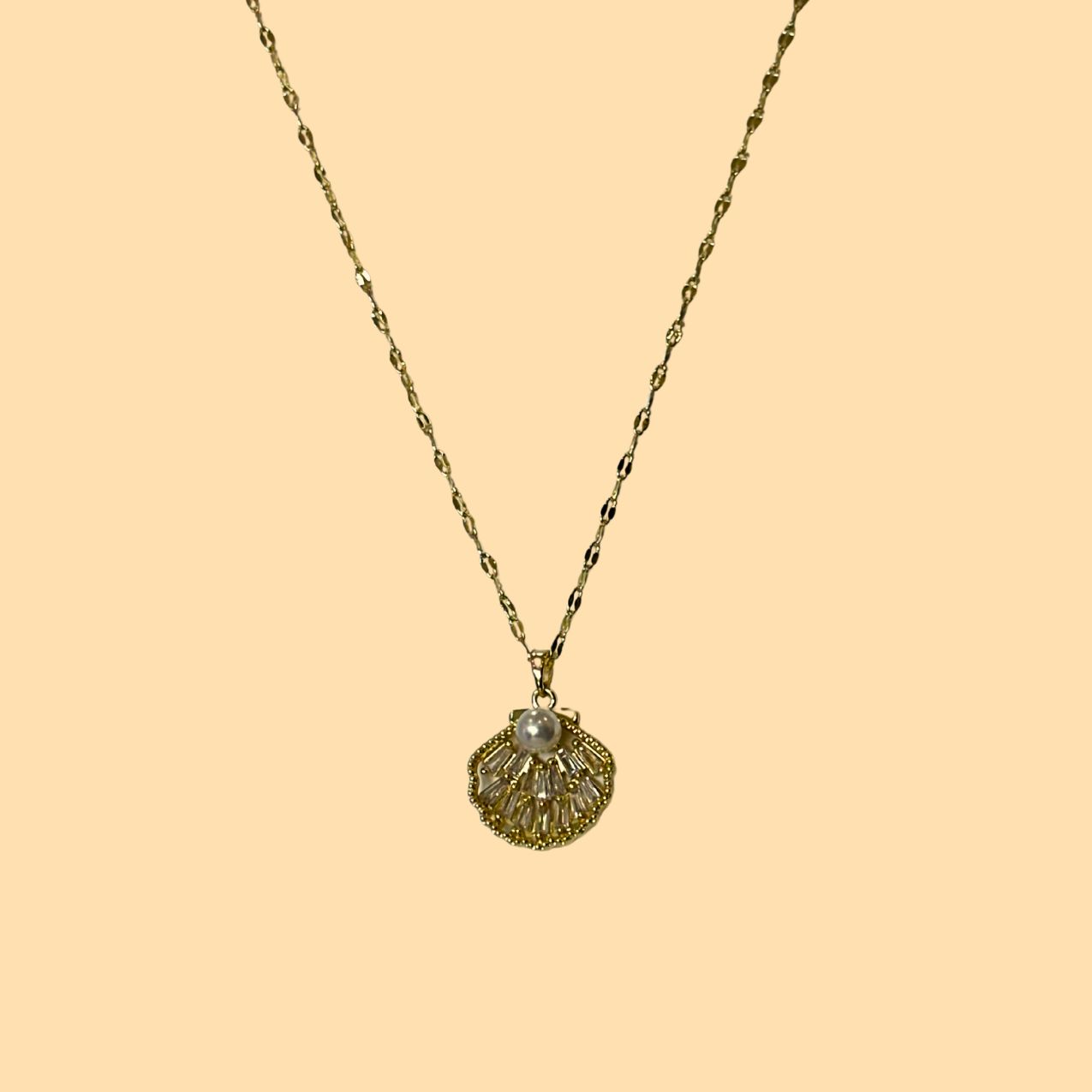 COLLAR CONCHA DORADO